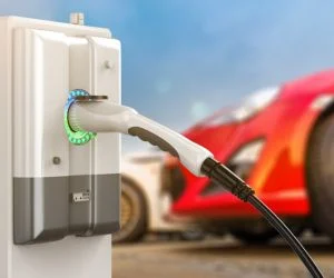 instalar punto recarga coche electrico casa en madrid coche rojo cargando